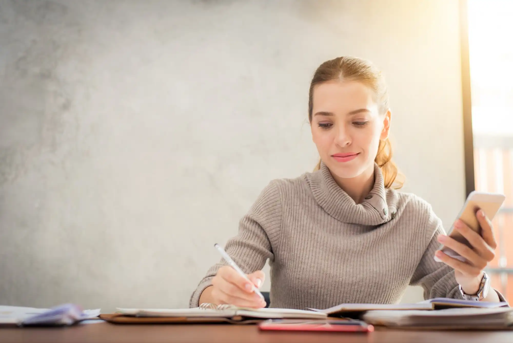 Woman reviewing documents, highlighting reasons for CORU application delays